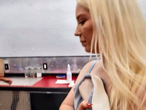 Gigi Strips in the Tattoo Shop