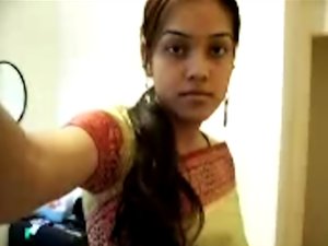 Cute Desi teen strips on cam